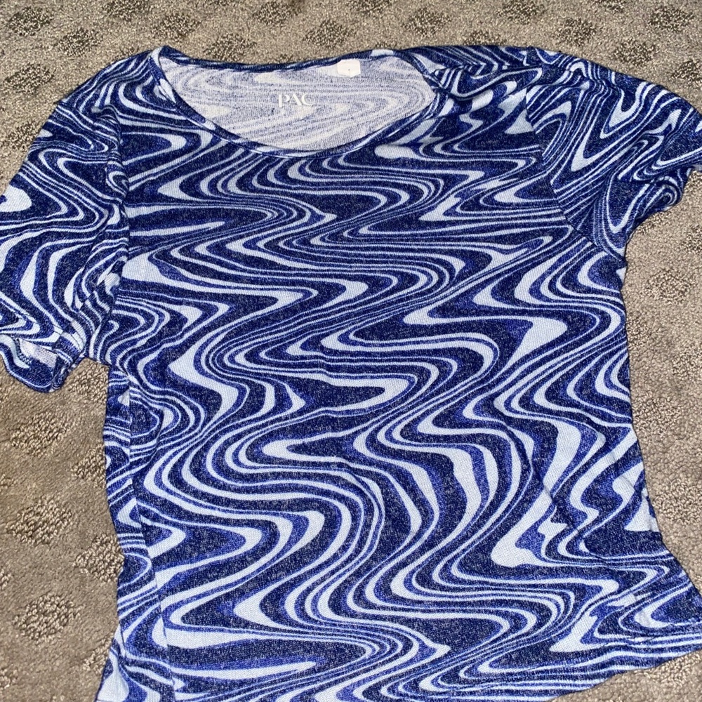 A swirly blue shirt